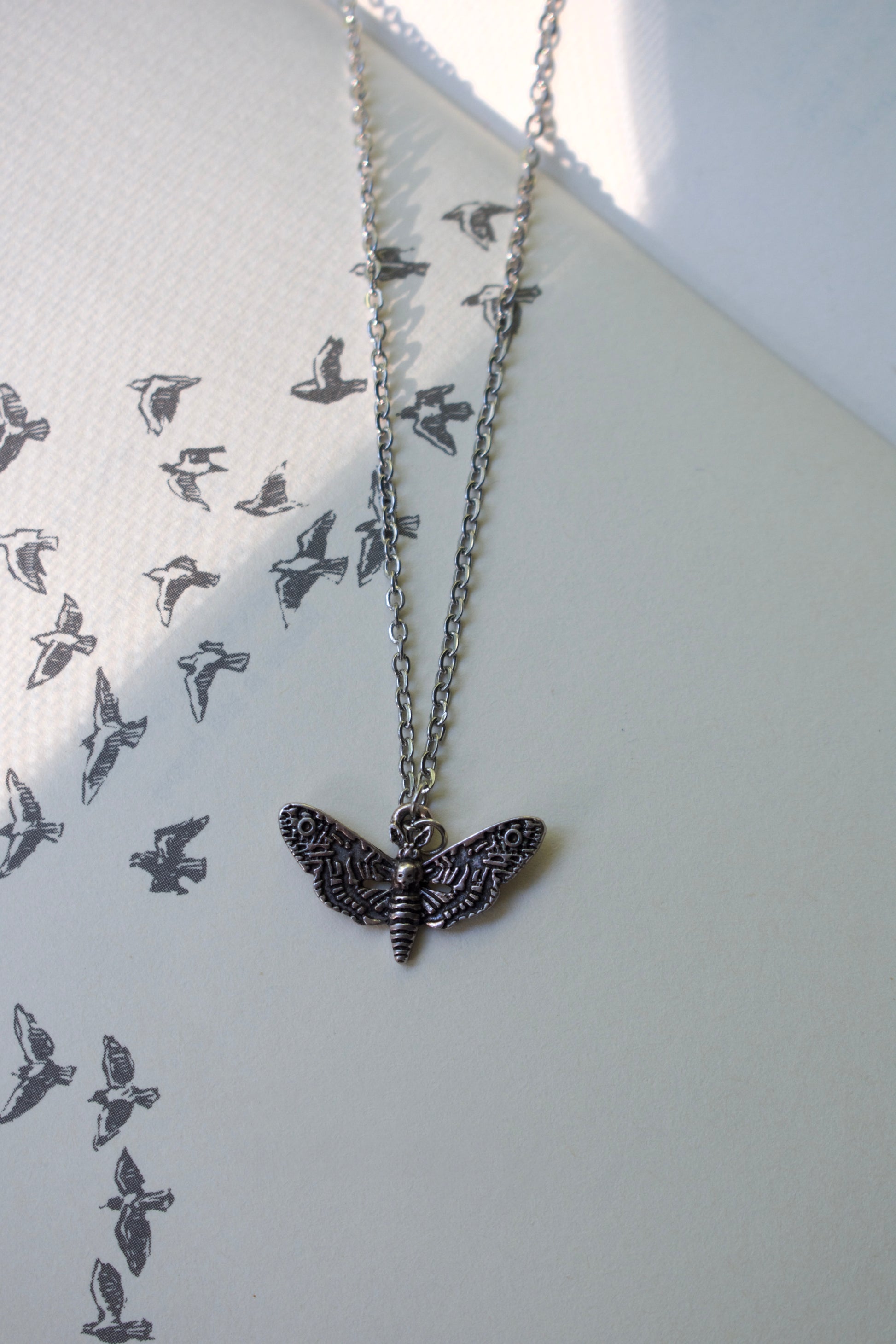 The Knight And The Moth Necklace